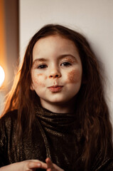 portrait of a child girl with glitter