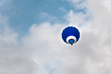 Hot air balloon over the blue sky over Igualada, Spain