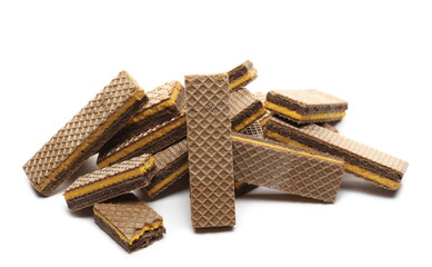 Wafer bars filled with cocoa and orange cream isolated on white background