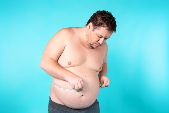 Funny fat man and diet. Healthy lifestyle. Man and tape.