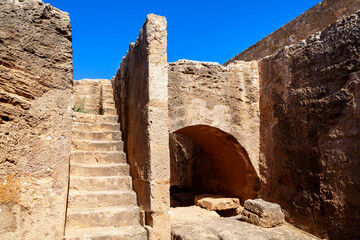 Tombs of the Kings near  Paphos Cyprus a 4th century BC necropolis, of burial chambers of the Roman Hellenic which is a popular tourist travel destination attraction landmark, stock photo image