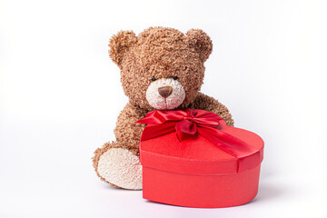 teddy bear with heart shaped box valentine's day isolated on white background