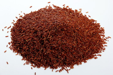 raw red rice background. uncooked brown wild rice, top view