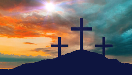 crucifixion, religion and christianity concept - silhouettes of three crosses on calvary hill over...