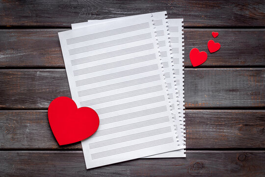 Musical sheet with heart shape. Love music concept.