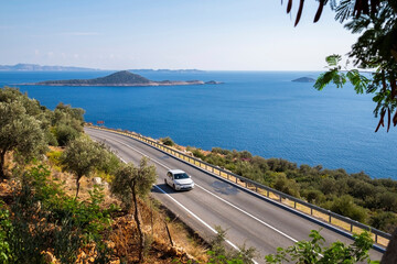 Naklejka premium Car driving along the Mediterranean coast in southern Turkey