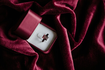 Romantic setting with an engagement ring on a Valentine's day