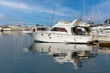 Fototapeta premium Moored sea boat.Parking for yachts
