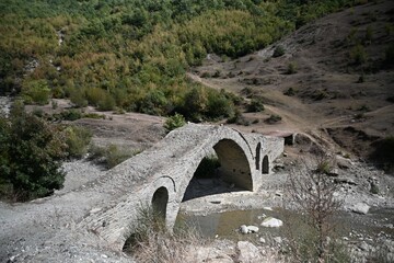 Fototapeta na wymiar Stone bridge on the river Osum in Albania