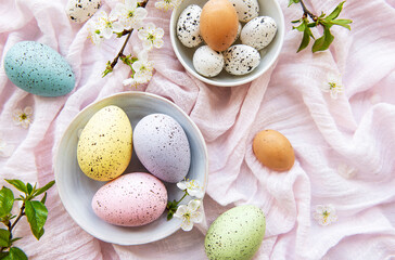 Colorful Easter eggs with spring blossom flowers