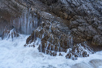 Swell and storm in the Hermitage of the Virgen del Mar San Roman de la Llanilla.Municipality of Santander. Virgen del Mar Island in the Cantabrian Sea. Autonomous Community of Cantabria. Spain. Europe