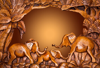 The wooden decoration as frame to tropical landscape with elephants. The concept of invitation to...