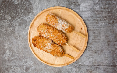 Korean street food corn dog cheese on skewer..