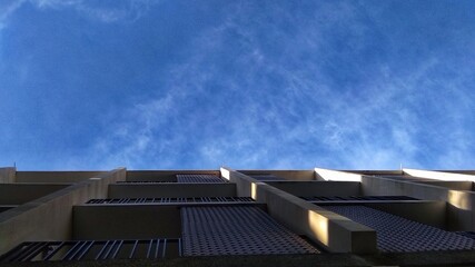 Fototapeta premium Building in the city and blue sky