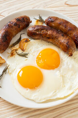double fried egg with pork sausage