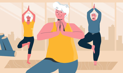 Senior people doing yoga in local yoga class