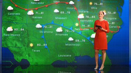 Live Weather News Studio with Professional Female On-Camera Meteorologist Standing Beside Screen and Making Gestures to Point at Weather Synoptic Map Chart for United States of America - obrazy, fototapety, plakaty