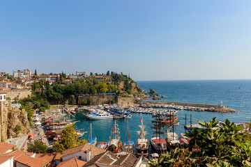 Antalya, Turkey - August 27, 2013: Anchored in the marina, historic yachts and tourist boats view...