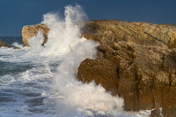 Swell and storm in the Hermitage of the Virgen del Mar San Roman de la Llanilla.Municipality of Santander. Virgen del Mar Island in the Cantabrian Sea. Autonomous Community of Cantabria. Spain. Europe