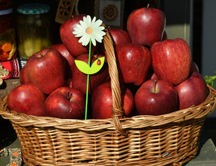 Basket with red apples. Apple detail.