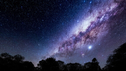 Mountains, rivers, stars and the Milky Way in the beautiful night sky.