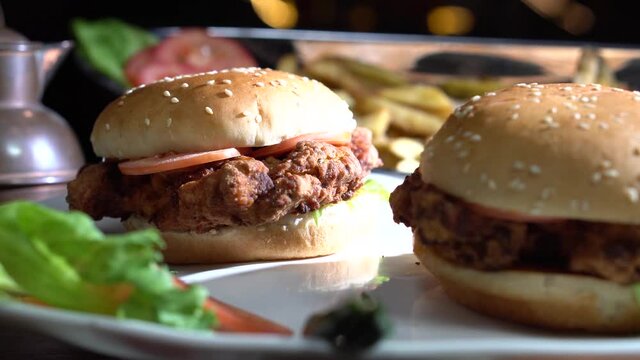 A zoom in shot of two zinger burgers.