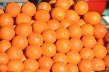 Organic oranges on sale. Product photography.