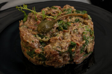 Raw beef tartar with capers