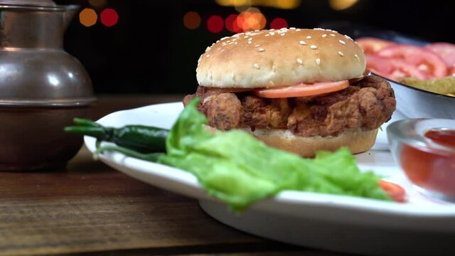  A pan shot of a zinger burger.