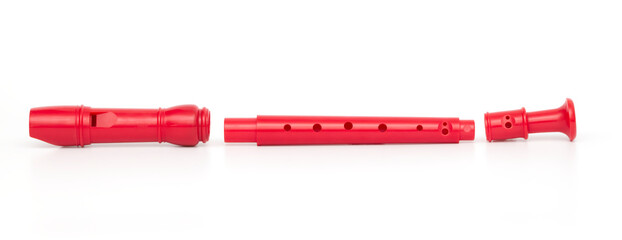 Red block flute isolated on white background