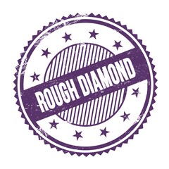 ROUGH DIAMOND text written on purple indigo grungy round stamp.