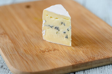 Blue cheese with white mould