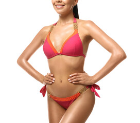 Obraz premium Sexy young woman in stylish swimsuit isolated on white, closeup. Beach body goal