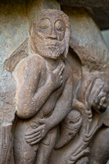 Fototapeta na wymiar Naked Adam, romanic cloister, Royal Monastery of San Juan de la Peña, Botaya, Huesca, Aragon, Spain