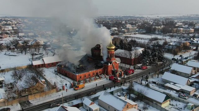 Large-scale fire in the church from above. The building is on fire