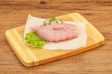 Raw turkey breast steak for cooking