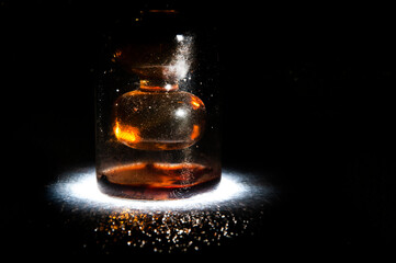 alchemy bottle  on a dark background