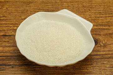 White sugar in the bowl