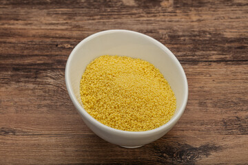 Raw cous cous heap in the bowl