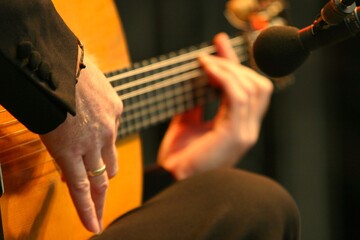 guitarist playing concert guitar