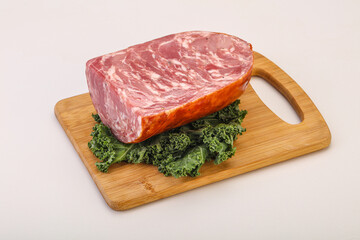 Beef ham piece over board