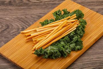 Chechel cheese sticks over board