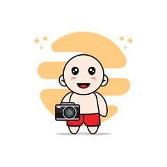 Obraz na płótnie Canvas Cute kids character holding a camera.