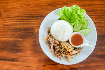 Fried garlic pork with Rice on white plate