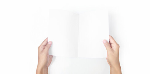 Hands holding paper blank for letter paper