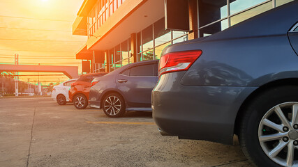 Car parking in line with sunlight background.