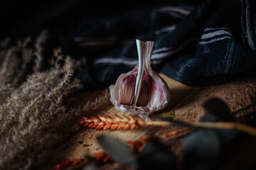 Garlic on a rustic chopping board