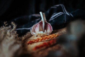 Garlic on a rustic chopping board