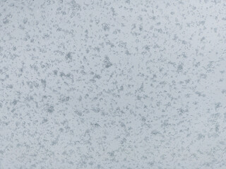 Close Up Winter Ice and Snow Sticking to Glass Window