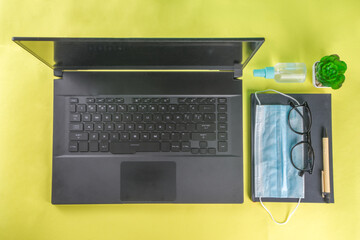 New normal Office reality, work at home concept. Office covid background, Laptop, notepad, office...
